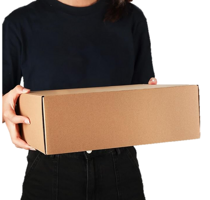 Image of person holding the mailer box